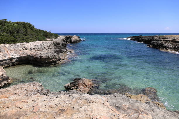 Picturesque seascape with cliffs in Ostuni, Salento coast. Puglia, Italy