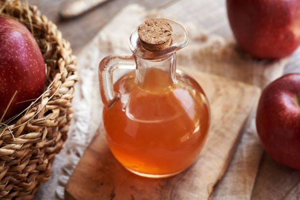 istock Apple cider vinegar in a glass bottle 2158887773