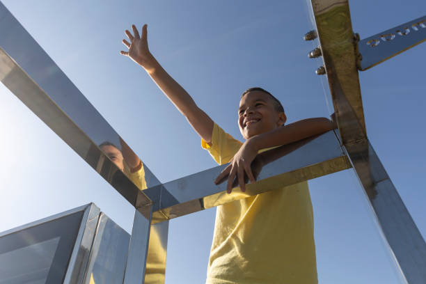 Boy jumping at free running sports ground in the morning