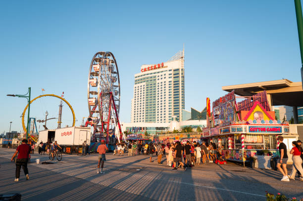 Windsor, Ontario, Canada - June 14, 2024:  The annual Windsor Riverfront Carnival has commenced for 2024.  It marks the unofficial launch of the summer season.   Midway rides, game of skill, food and drink etc.