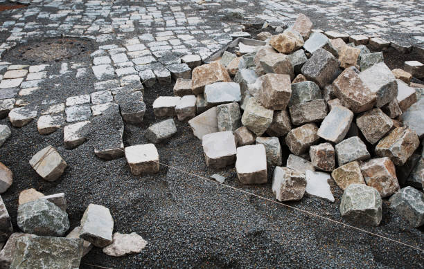 istock road paving stones laying renovation ancient old 2158896396