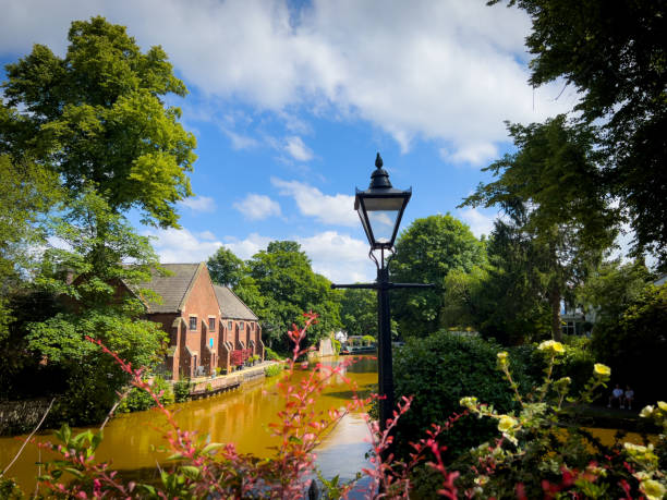 A photograph of The Bridgewater Canal at Worsley Delph. This soft focus photograph was created on a beautiful summer day in the idyllic village of Worsley in Salford, Greater Manchester, England
