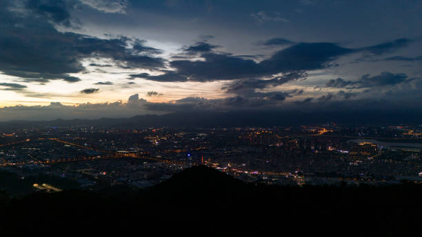 istock Cloudy city sunset night scene 2158904395