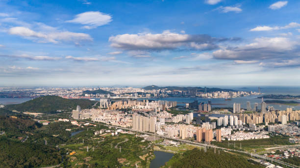 istock Modern city under blue sky and white clouds 2158904469