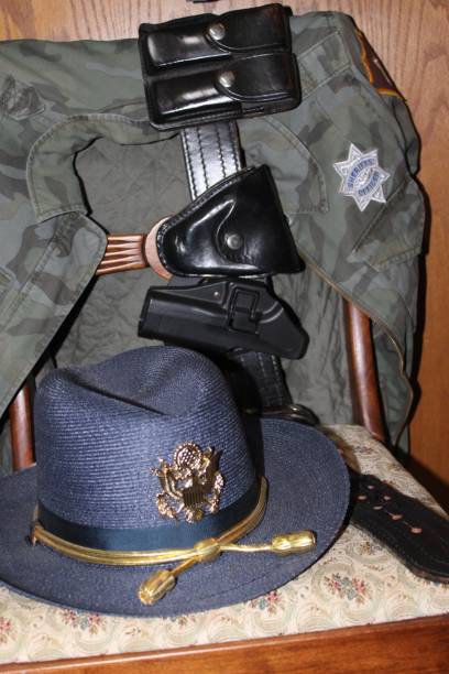 istock police officer uniform closet 2158909402