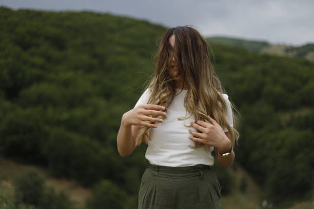 woman walking in nature and having a good time