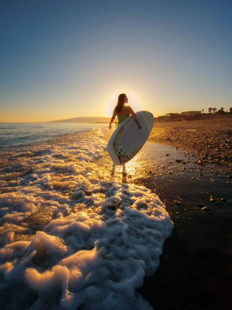 Gold Coast silhouette of lone surfer at sunset