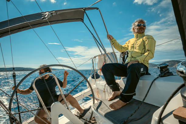 istock Two adults using a sailboat in the Aegean Sea. 2158913427