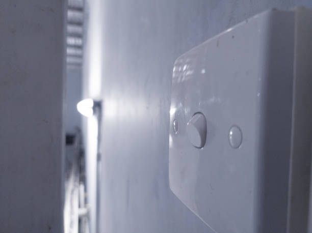 istock The Switch lamp on the wall building interior in industry. 2158914525