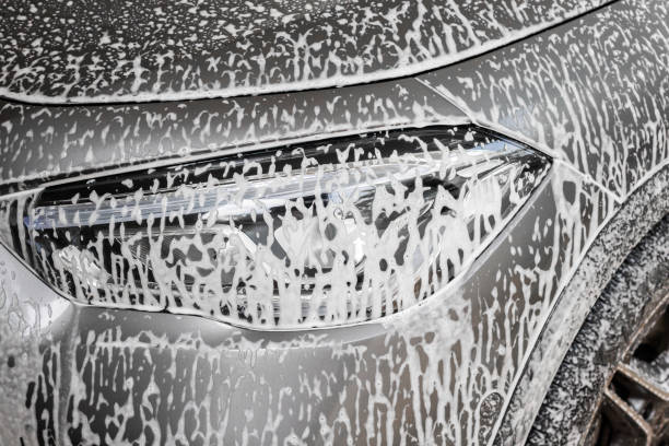 istock car cleaning and washing with foam soap 2158914579