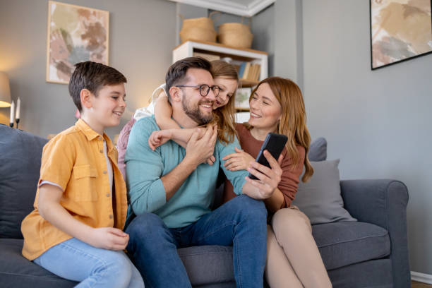 istock Family spending quality time with smartphone 2158914833