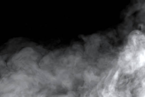 istock White smoke isolated on black background. 2158916327
