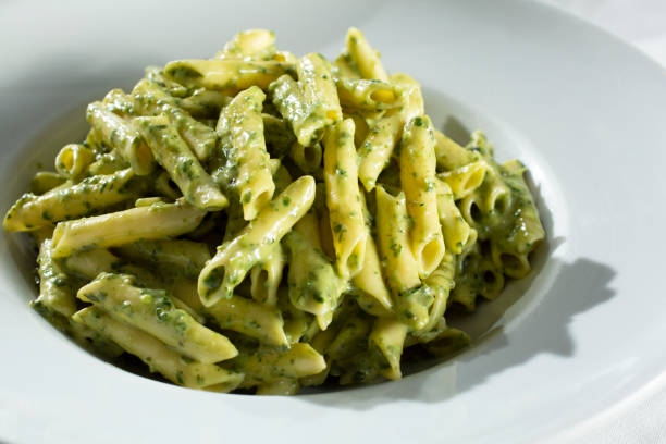 istock Pesto with penne sauce 2158917567