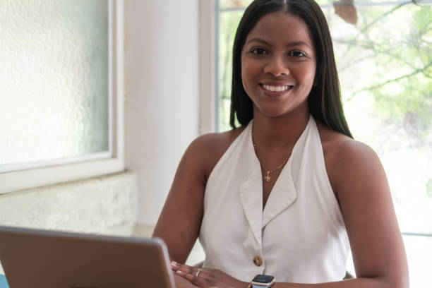 istock Smiling Woman Working from Home 2158922400