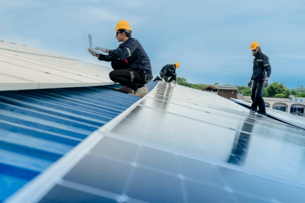 istock engineer man inspects construction of solar cell panel or photovoltaic cell by electronic device. Industrial Renewable energy of green power. factory worker working on tower roof. 2158923023