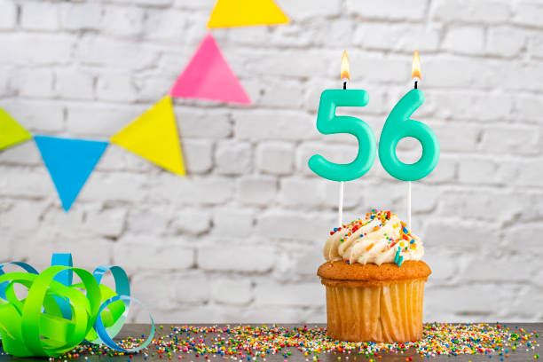 istock Candle number 56 - Birthday celebration with cupcake 2158923471