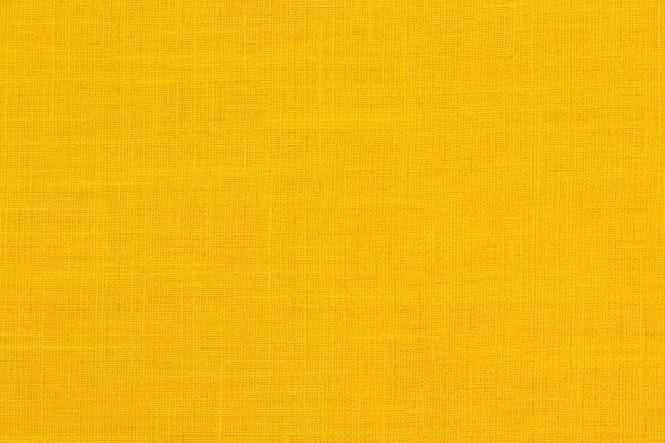 istock Yellow linen fabric cloth texture background, seamless pattern of natural textile. 2158926504