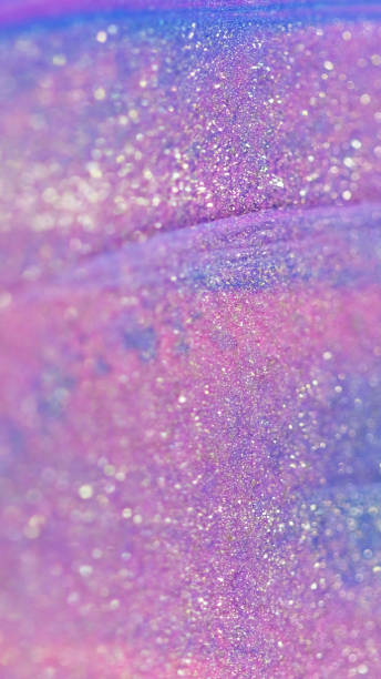 istock Glitter fluid texture liquid shimmer spill pink 2158927389