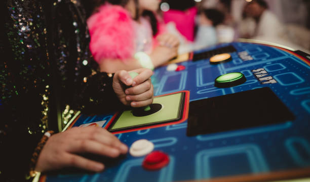 Kids playing video games with joystick and screen