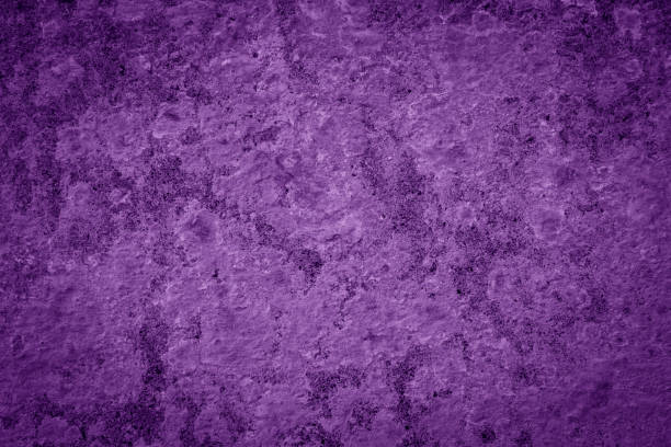 istock A purple wall with a textured surface. The wall is painted in a purple 2158929345