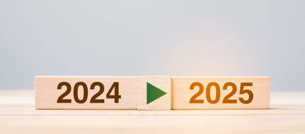 istock 2025 and 2024 wooden block on table background. Resolution, strategy, countdown, goal, change and New Year holiday concepts 2158932679