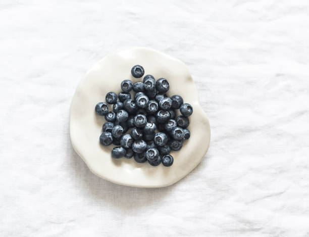 Healthy breakfast with fruits and berries, juice and muesli