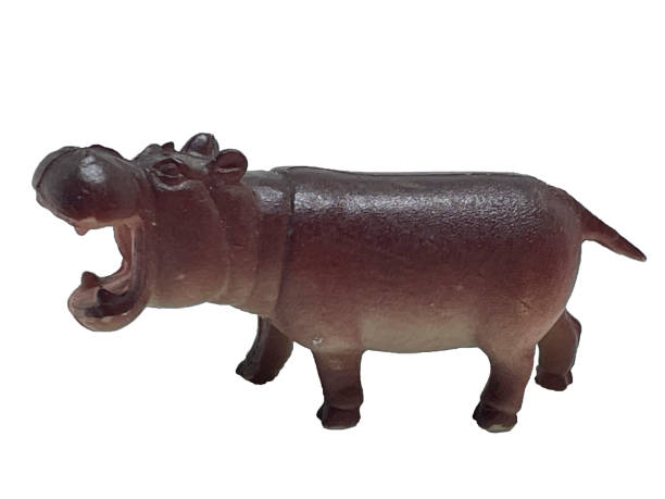 istock A hippo toy with an erect mouth on a white background 2158936702