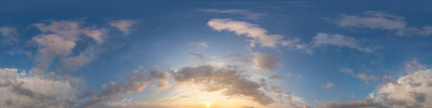 istock Sunset sky panorama with bright glowing pink Cumulus clouds. HDR 360 seamless spherical panorama. Full zenith or sky dome for 3D visualization, sky replacement for aerial drone panoramas. 2158937736