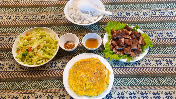 istock Traditional Dinner Of Vietnamese With Rice, Vegetable, Grilled Pork And Fried Egg. 2158941551