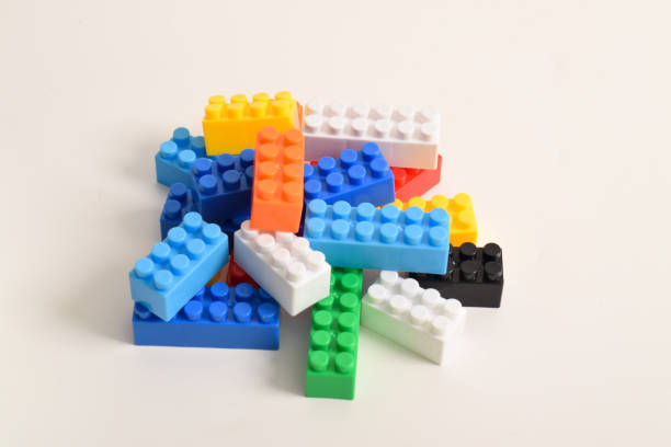 Pile of Colorful Plastic toy blocks isolated on white background. Building Blocks