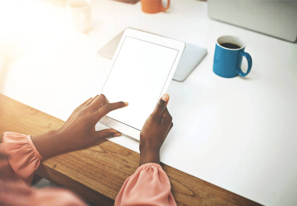 istock Business woman, touch and browsing with tablet screen for research, app or interface at office desk. Closeup of female person or employee scrolling on technology or display for news on mockup space 2158947733
