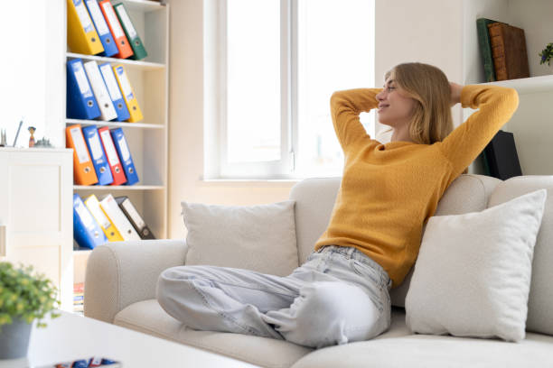 istock Happy young woman dreaming 2158949862