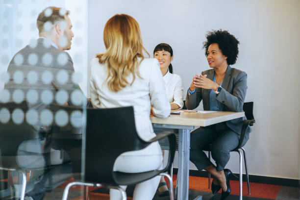 istock Group business meeting around a table 2158956310