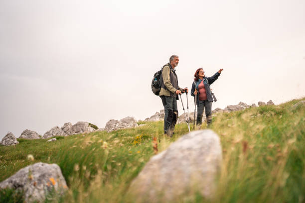 istock Active Senior Couple Enjoying Nature Trail 2158956652