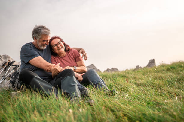 istock Senior Couple Enjoying Pause on Hiking Adventure 2158956734