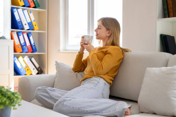 istock Having coffee and relaxing at home 2158957072