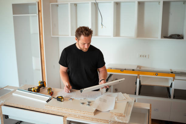 istock Focused Man Building Kitchen Furniture 2158960100