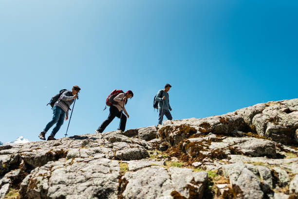 istock Friends doing a trail on a Laguna Radian, Peru 2158961534