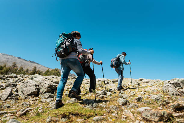 istock Friends doing a trail on a Laguna Radian, Peru 2158961538