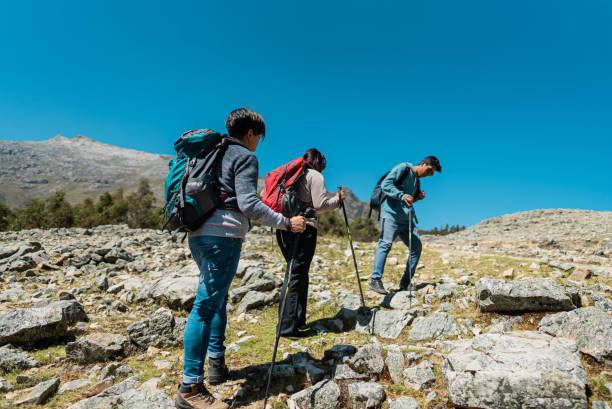 istock Friends doing a trail on a Laguna Radian, Peru 2158963260