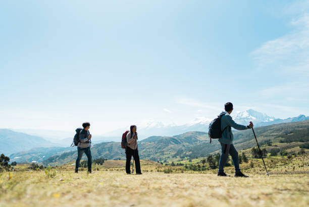 istock Friends doing a trail on a Laguna Radian, Peru 2158963477