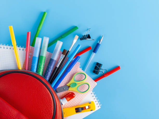 istock Stationery for studying against the background of a student's backpack 2158965101