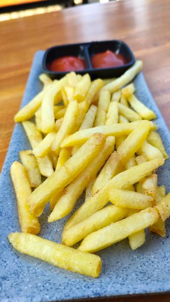 istock French fries with sauce 2158967172