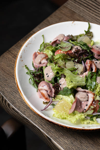 istock Duck and Salad on White Plate 2158968449