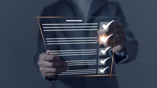 istock Businessman ticks boxes for document quality checklist, questionnaire, evaluation, online survey. business approval project concept 2158970188