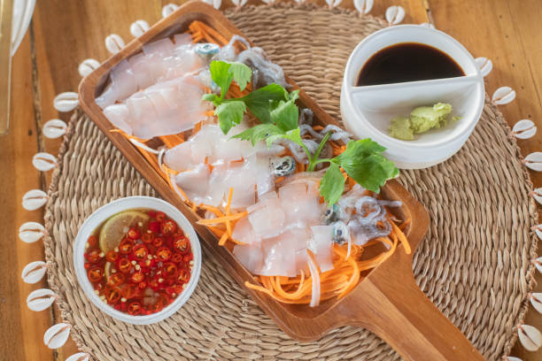 istock Fresh Squid Sashimi with dipping sauce 2158970208