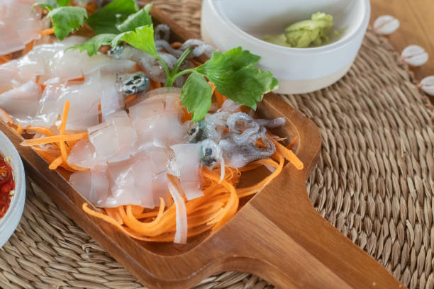 istock Fresh Squid Sashimi with dipping sauce 2158970278