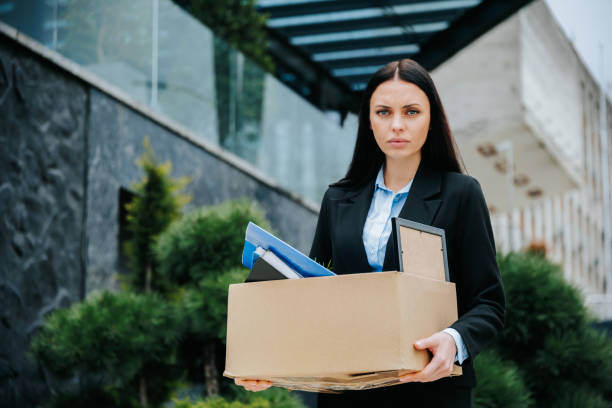 istock Lost Job, Lost Hope Woman Standing Alone with Workless Future 2158970497