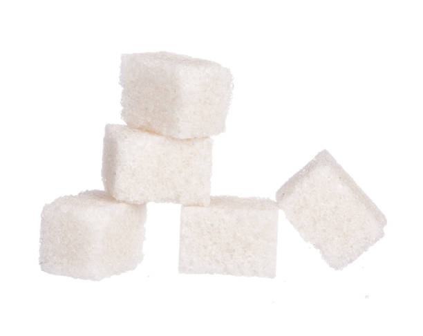 istock Cubes of sugar isolated on white background 2158971558