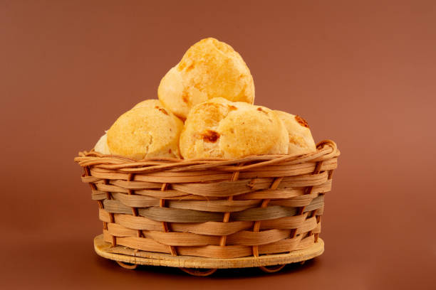 istock Cheese bread (Brazilian pao de queijo mineiro) in front view, clean background wooden basket 2158974236